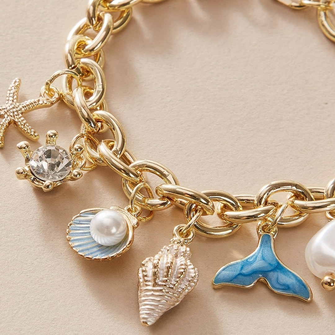 Elegant Ocean-Inspired Golden-Tone Charm Bracelet