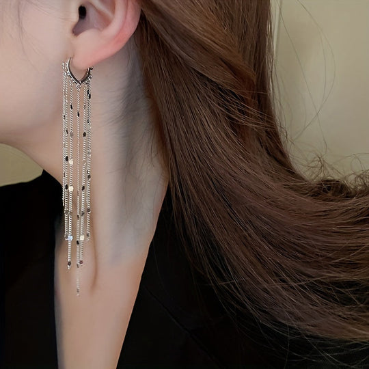 Oval Golden Earrings With Shiny Tassels