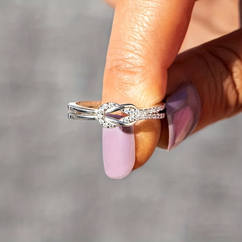Elegant Twist Infinity Cubic Zirconia Ring