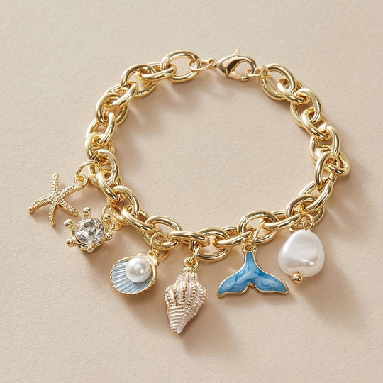 Elegant Ocean-Inspired Golden-Tone Charm Bracelet