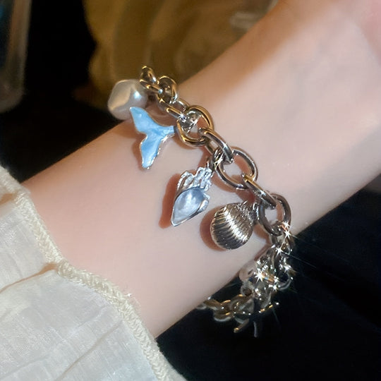 Elegant Ocean-Inspired Golden-Tone Charm Bracelet