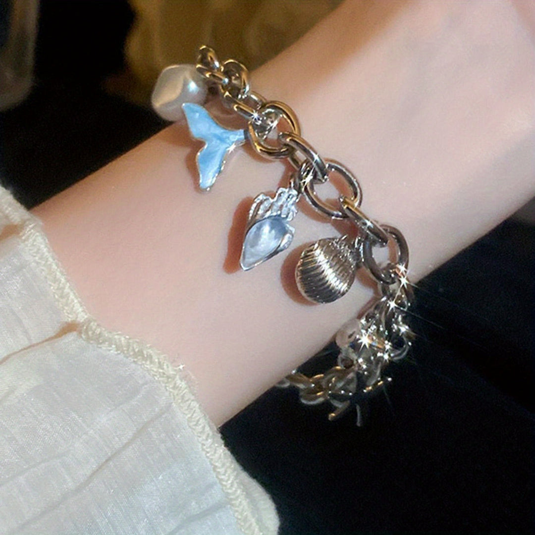 Elegant Ocean-Inspired Golden-Tone Charm Bracelet