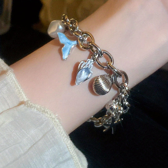 Elegant Ocean-Inspired Golden-Tone Charm Bracelet