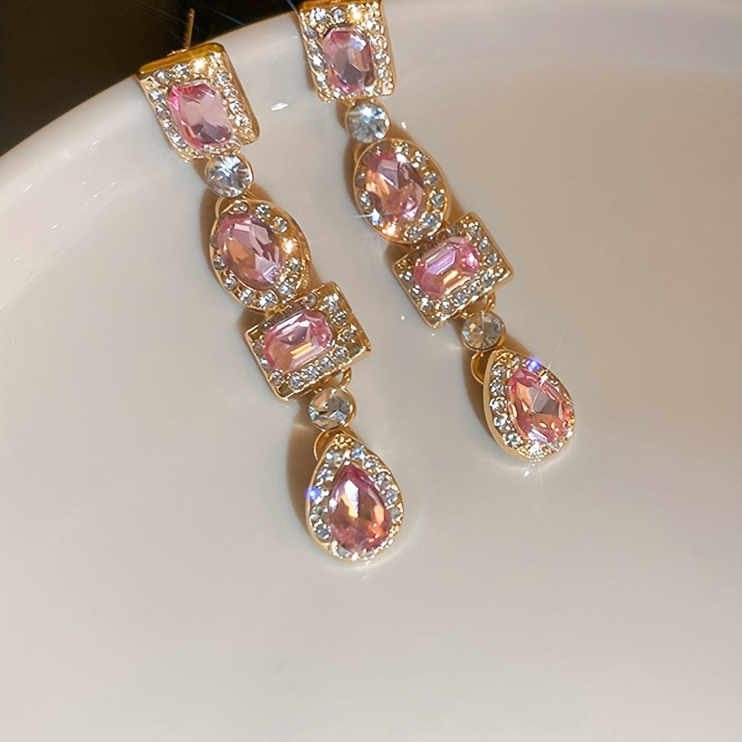 Golden Dangle Earrings with Emerald & Clear Gemstones