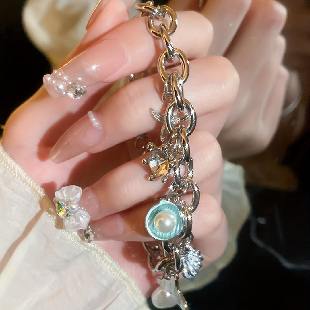 Elegant Ocean-Inspired Golden-Tone Charm Bracelet