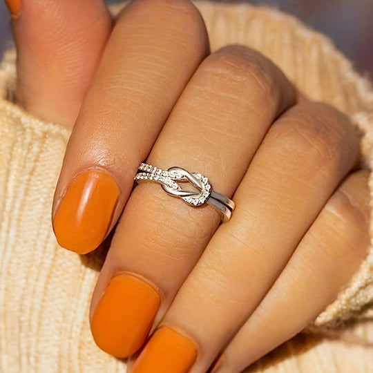 Elegant Twist Infinity Cubic Zirconia Ring