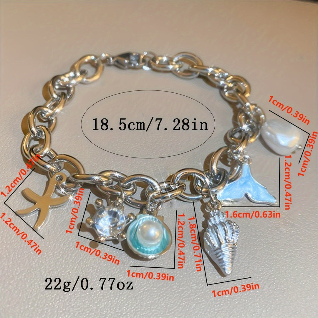 Elegant Ocean-Inspired Golden-Tone Charm Bracelet