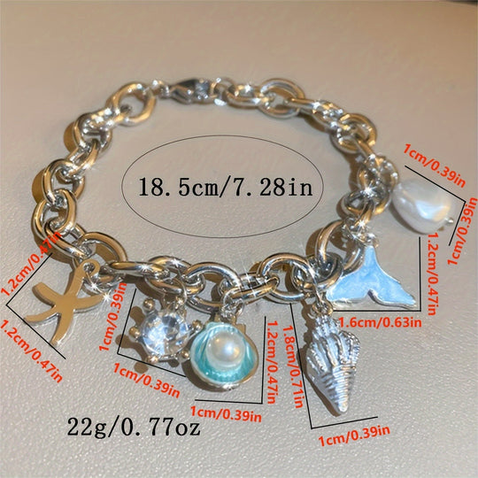 Elegant Ocean-Inspired Golden-Tone Charm Bracelet