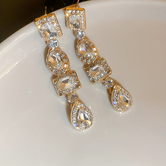 Golden Dangle Earrings with Emerald & Clear Gemstones