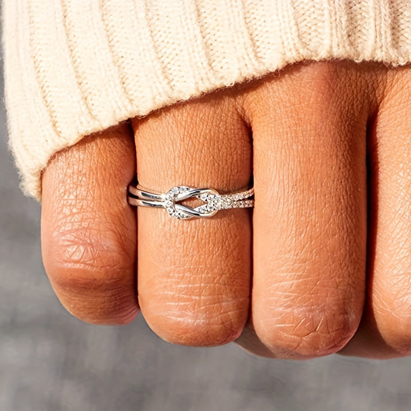 Elegant Twist Infinity Cubic Zirconia Ring
