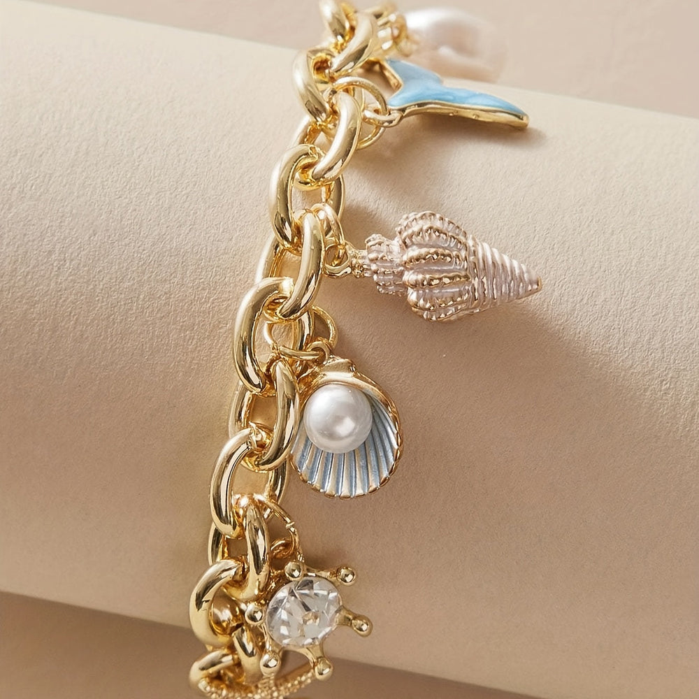 Elegant Ocean-Inspired Golden-Tone Charm Bracelet