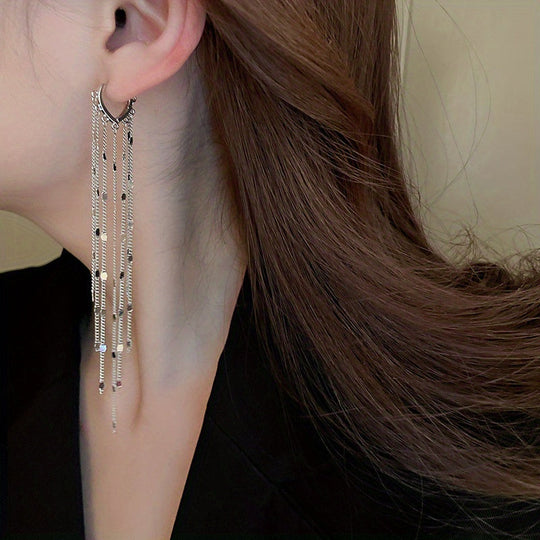 Oval Golden Earrings With Shiny Tassels
