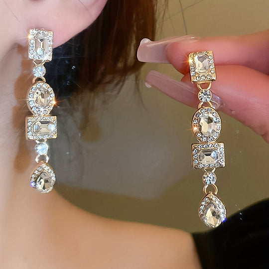 Golden Dangle Earrings with Emerald & Clear Gemstones