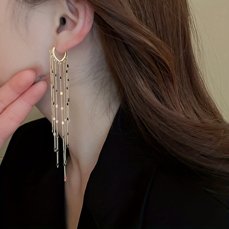 Oval Golden Earrings With Shiny Tassels