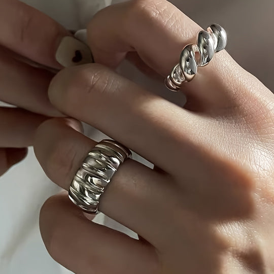 Two Simple Geometric Round Rings